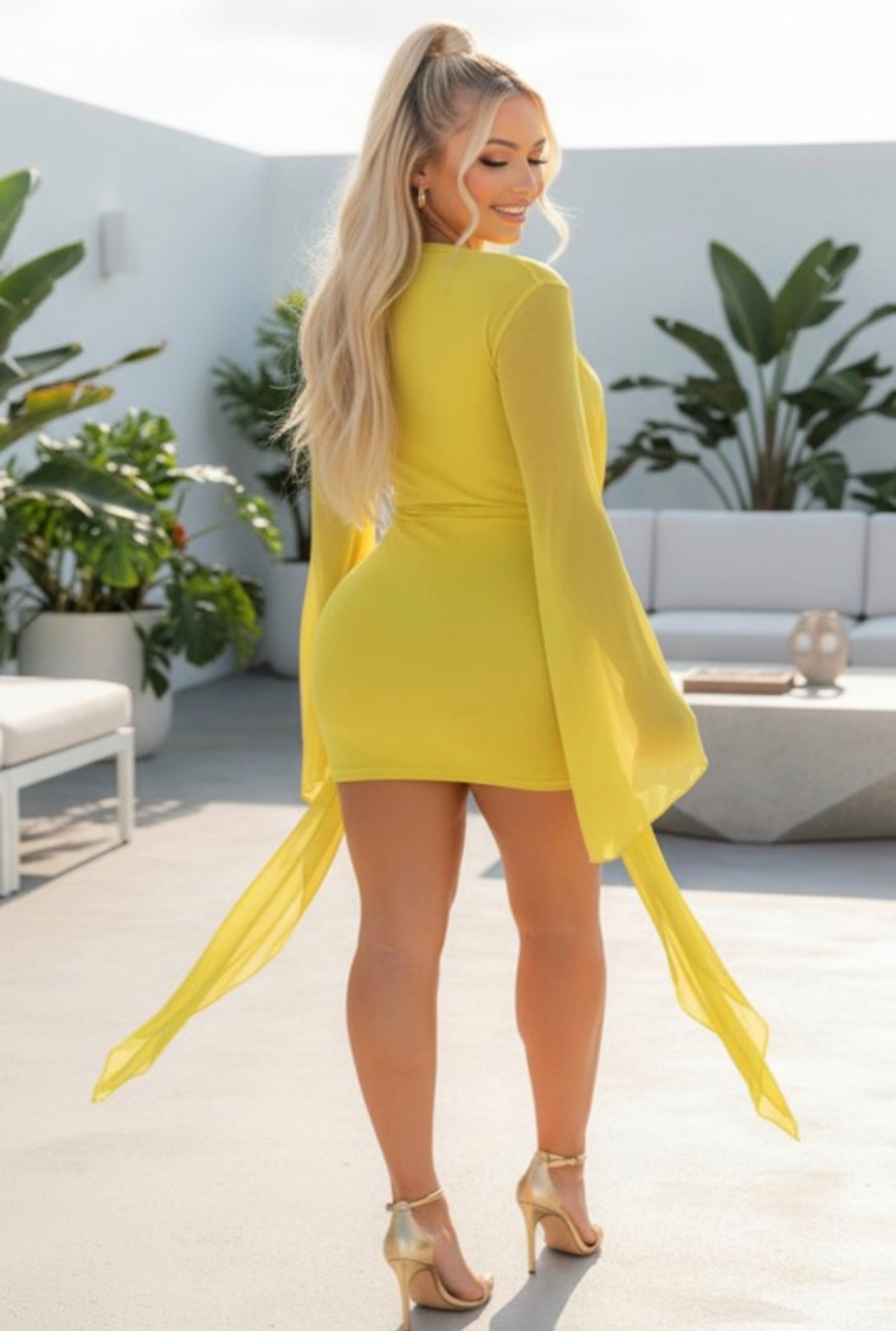 Donti Deep plunge mini Dress